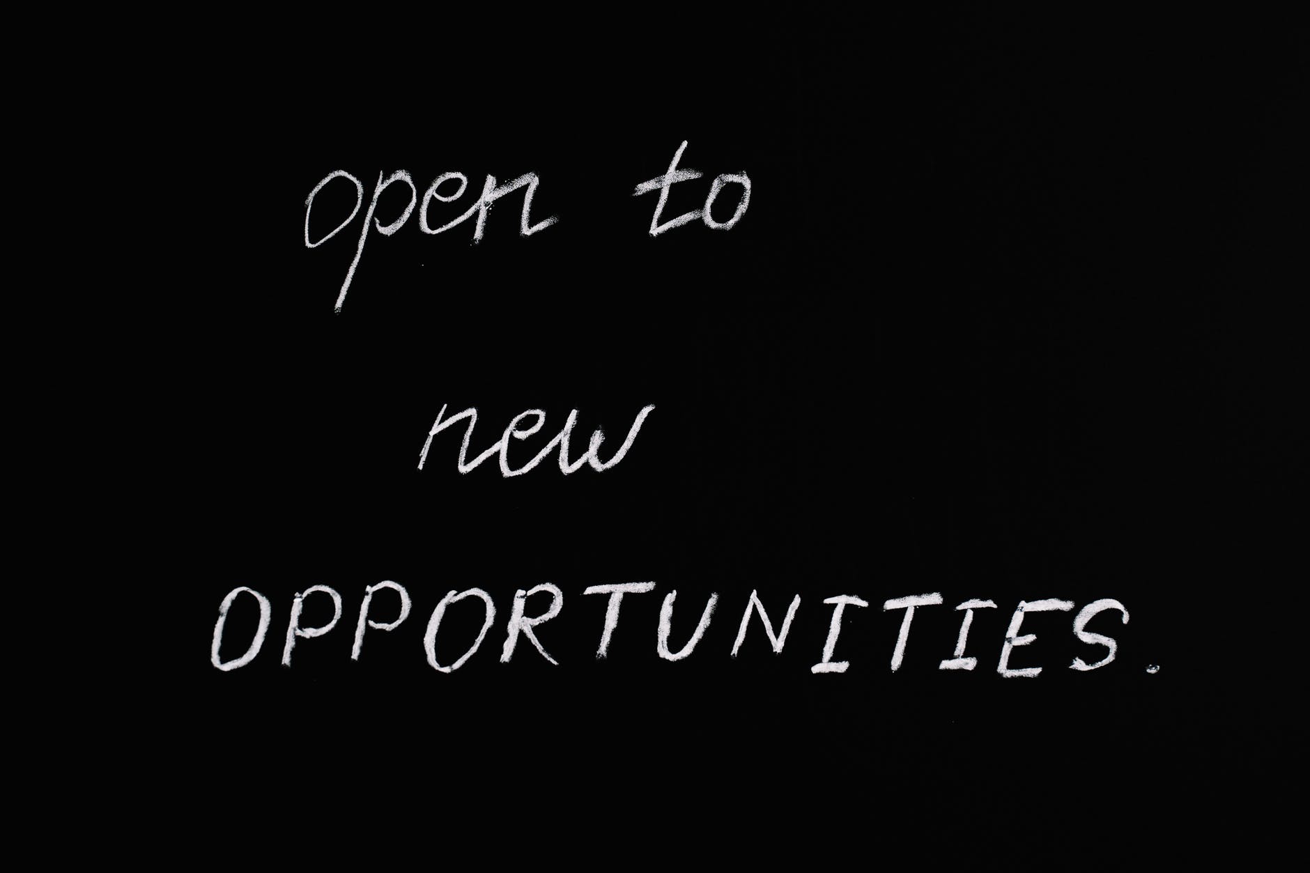 open to new opportunities lettering text on black background